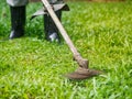 Close up the man mowing the grass. Gardening concept. Royalty Free Stock Photo