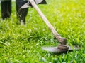 Close up the man mowing the grass. Gardening concept. Royalty Free Stock Photo