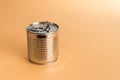 Close-up of man opening a tin can Royalty Free Stock Photo