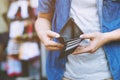 Close up man person holding an empty wallet in the hands of an man no money out of pocket Royalty Free Stock Photo