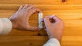 Close-up of man placing sample into a buffer dropper for seft detection of virus Royalty Free Stock Photo