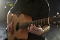 Close Up Of Man Playing Acoustic Guitar In Studio Royalty Free Stock Photo