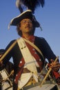 Close up of man playing drum during American Revolutionary war reenactment