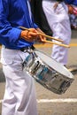 Close up of a man playing drum during Festival of the Virgin de