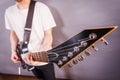 Close up of man playing on electric guitar Royalty Free Stock Photo