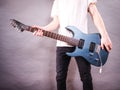 Close up of man playing on electric guitar Royalty Free Stock Photo