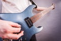 Close up of man playing on electric guitar Royalty Free Stock Photo