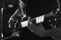 Close Up Of Man Playing Electric Guitar Shot In Monochrome Royalty Free Stock Photo