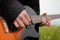 Close up of a man playing guitar Royalty Free Stock Photo