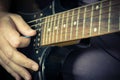 Close-up of man playing lead guitar solo