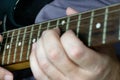 Close-up of man playing lead guitar solo