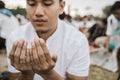 Close up a man praying during Eid al-Fitr Royalty Free Stock Photo