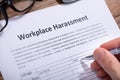 Man Filling Workplace Harassment Form Royalty Free Stock Photo
