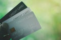 Hand holding three credit cards for shopping online Royalty Free Stock Photo