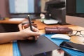 Close-up of a man's hand with a pen stylus Royalty Free Stock Photo