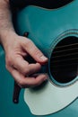 Close up of man\'s hand playing acoustic guitar. Concept of music Royalty Free Stock Photo
