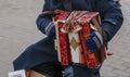 Close-up of a man's hand playing button accordion outdoors in winter Royalty Free Stock Photo