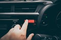 Close-up Of Man`s Hand Pressing Emergency Button In Car Royalty Free Stock Photo
