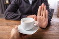 Man Refusing Cup Of Coffee Offered By Person Royalty Free Stock Photo