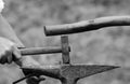 Close-up of man`s hand using a rustic hammer Royalty Free Stock Photo