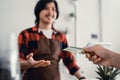 Cashier at the cafe accepts credit card payments Royalty Free Stock Photo