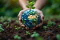 Close-up of a man& x27;s hands holding a globe of the earth. Earth Day Concept Save the World save the environment Royalty Free Stock Photo