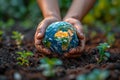 Close-up of a man& x27;s hands holding a globe of the earth. Earth Day Concept Save the World save the environment Royalty Free Stock Photo