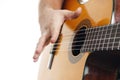 Close up of man`s hands playing acoustic guitar flamenco. Music for recreation or hobby concept Royalty Free Stock Photo