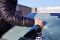 Close up of man scraping ice Royalty Free Stock Photo