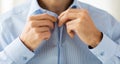 Close up of man in shirt dressing Royalty Free Stock Photo