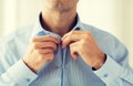 Close up of man in shirt dressing Royalty Free Stock Photo
