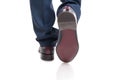 Close-up of man shoes from behind in walking position Royalty Free Stock Photo