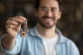 Close up of man show keys to new home Royalty Free Stock Photo
