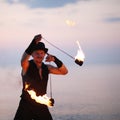Close up of a man spinning fire poi Royalty Free Stock Photo