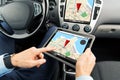 Close up of man with tablet pc in car Royalty Free Stock Photo