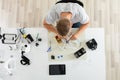 Man Testing Electric Current Of Drone Using Multimeter Tool Royalty Free Stock Photo