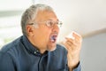 Man Using Asthma Inhaler Royalty Free Stock Photo