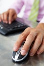 Close up man using keyboard and mouse Royalty Free Stock Photo