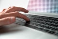 Close up. man using a keyboard shortcut on a laptop keyboard.