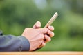 Close-up of a man using mobile smartphone. Selective focus Royalty Free Stock Photo
