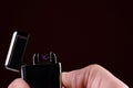 Close up of man using a plasma arc lighter. Royalty Free Stock Photo