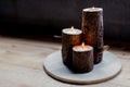 Woodwork project making three rustic wooden tea light candle holders Royalty Free Stock Photo