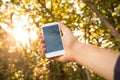 Close up of a man using mobile smart phone outdoor Royalty Free Stock Photo