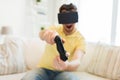 Close up of man in virtual reality headset playing Royalty Free Stock Photo