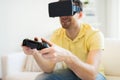 Close up of man in virtual reality headset playing Royalty Free Stock Photo