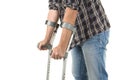 Close up of a man walking with crutches isolated on a white back Royalty Free Stock Photo