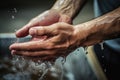 Close-up of a man washing his hands under running water.Generative AI Royalty Free Stock Photo