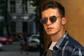 close-up of a man whish sunglasses,male portrait