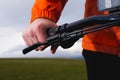 Close up, a man& x27;s hand on the handlebars of a bicycle, compresses the handle to cook from the start, nature is in Royalty Free Stock Photo