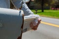 Close-up Of Man& x27;s Hand Taking Letter From Mailbox Outside House Royalty Free Stock Photo